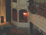 The stage left proscenium boxes. 